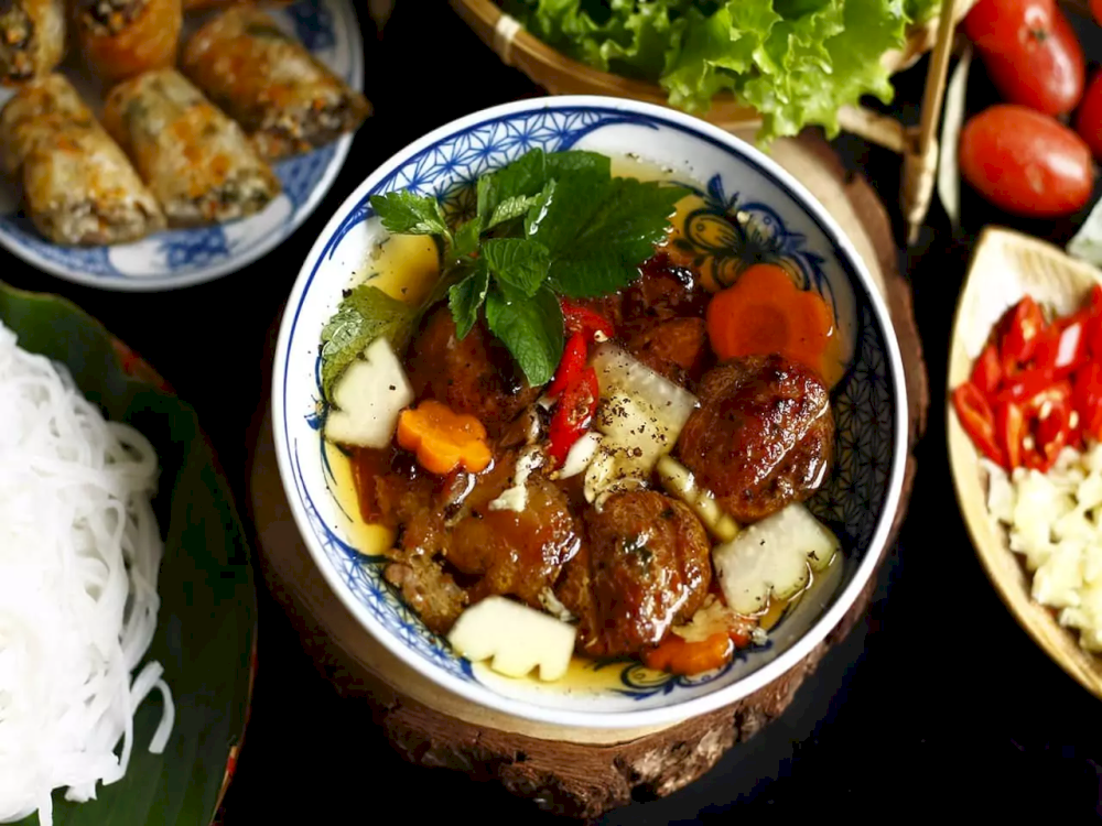 The captivating history of Bun Cha Hanoi dates back to the streets of Hanoi, where it has been a cherished dish for generations